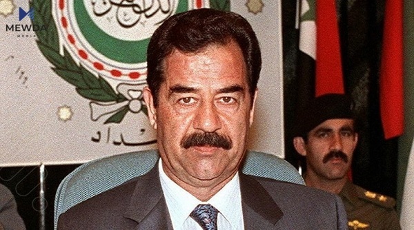 هەڵواسینی وێنەیەکی سەدام مشتومڕی بە دوادا دێت